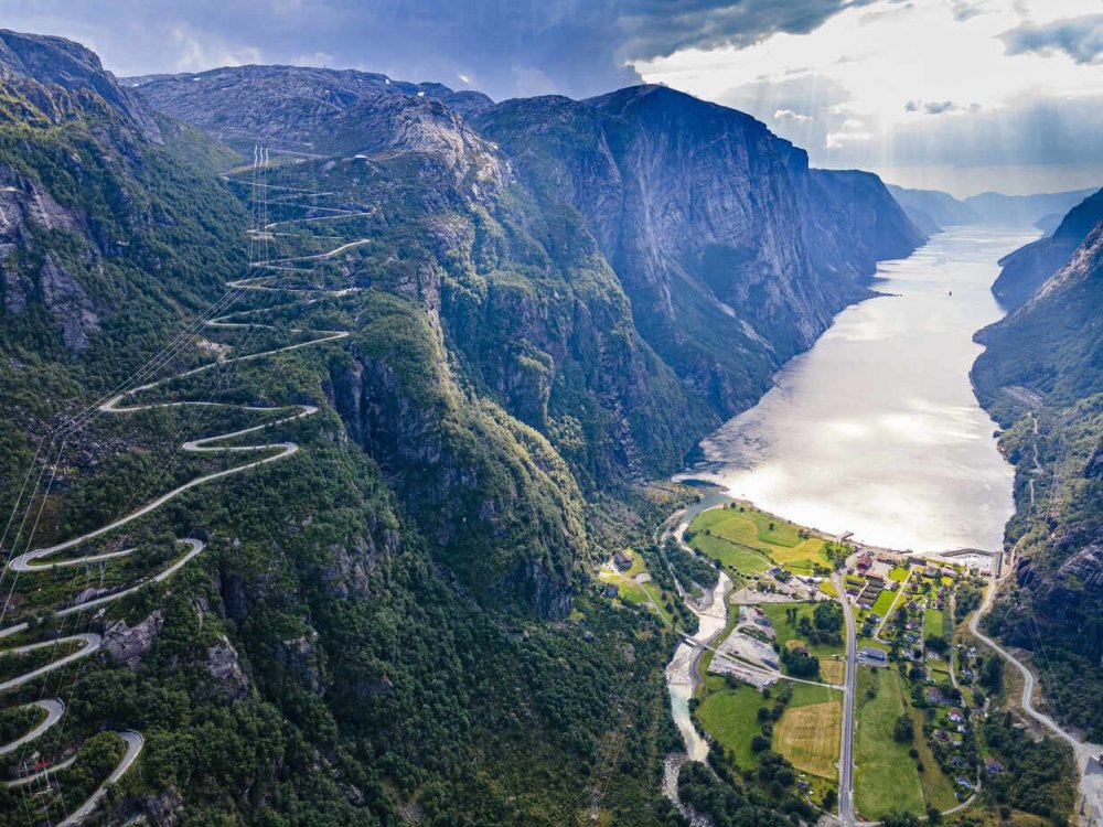 zigzag-road-leading-down-to-lysebodn-at-the-end-of-lystrefjord-lysefjord-rogaland-norway-scandinavia-europe-RHPLF19389.jpg
